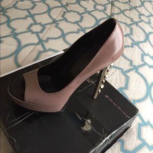 Women heels with gold on heel
